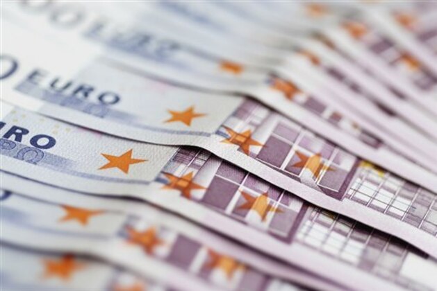 Close-up of Euro Dollars (Glow Images via AP Images)