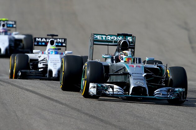 AUSTIN, TX - NOVEMBER 02:  Lewis Hamilton of Great Britain and Mercedes GP leads Felipe Massa of Brazil and Williams and Valtteri Bottas of Finland and Williams during the United States Formula One Grand Prix at Circuit of The Americas on November 2, 2014 in Austin, United States.  (Photo by Mark Thompson/Getty Images)