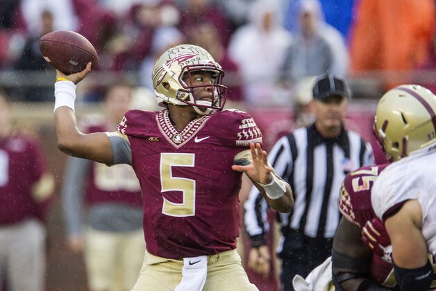 Florida State quarterback Jameis Winston throws in the first half of an NCAA college football game against Boston College in Tallahassee, Fla., Saturday, Nov. 22, 2014.  Florida State defeated Boston College 20-17.  (AP Photo/Mark Wallheiser)