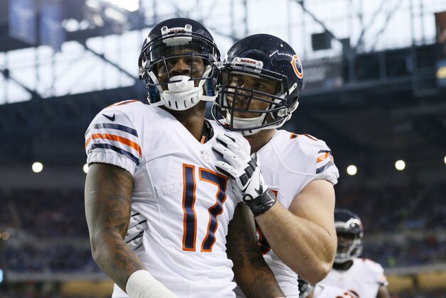 Chicago Bears wide receiver Alshon Jeffery (17) is congratulated after his 6-yard touchdown reception during the first half of an NFL football game against the Detroit Lions in Detroit, Thursday, Nov. 27, 2014. (AP Photo/Rick Osentoski)
