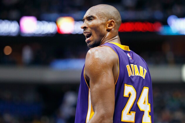 DALLAS, TX - NOVEMBER 21:  Kobe Bryant #24 of the Los Angeles Lakers reacts to a call against the Dallas Mavericks in the third quarter at American Airlines Center on November 21, 2014 in Dallas, Texas. NOTE TO USER: User expressly acknowledges and agrees that, by downloading and or using this photograph, User is consenting to the terms and conditions of the Getty Images License Agreement.  (Photo by Tom Pennington/Getty Images)