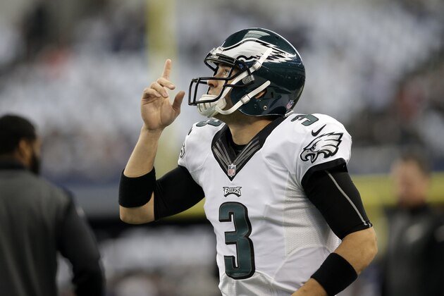 Philadelphia Eagles quarterback Mark Sanchez (3) warms up before an NFL football game against the Dallas Cowboys, Thursday, Nov. 27, 2014, in Arlington, Texas. (AP Photo/Tim Sharp)