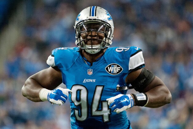 Nov 27, 2014; Detroit, MI, USA; Detroit Lions defensive end Ezekiel Ansah (94) celebrates during the fourth quarter against the Chicago Bears at Ford Field. Detroit won 34-17. Mandatory Credit: Tim Fuller-USA TODAY Sports