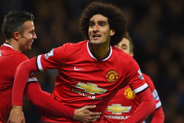 WEST BROMWICH, ENGLAND - OCTOBER 20:  Marouane Fellaini of Manchester United celebrates with Robin van Persie (L) and Adnan Januzaj (R) as he scores their first and equalising goal during the Barclays Premier League match between West Bromwich Albion and Manchester United at The Hawthorns on October 20, 2014 in West Bromwich, England.  (Photo by Michael Regan/Getty Images)