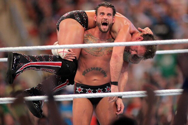 C.M. Punk competes against Chris Jericho at WrestleMania XXVIII in Sun Life Stadium on April 1, 2012 in Miami, Florida. (AP Images/Marc Serota)