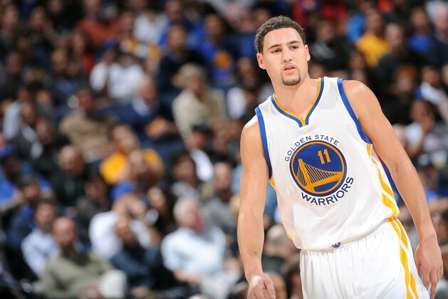 OAKLAND, CA - NOVEMBER 11: Klay Thompson #11 of the Golden State Warriors looks on during the game against the San Antonio Spurs on November 11, 2014 at Oracle Arena in Oakland, California. NOTE TO USER: User expressly acknowledges and agrees that, by downloading and or using this photograph, user is consenting to the terms and conditions of Getty Images License Agreement. Mandatory Copyright Notice: Copyright 2014 NBAE (Photo by Noah Graham/NBAE via Getty Images)