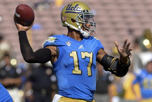 Oct 11, 2014; Pasadena, CA, USA; UCLA Bruins quarterback Brett Hundley (17) throws a pass during the second quarter against the Oregon Ducks at the Rose Bowl. Oregon went on to a 42-30 win. Mandatory Credit: Robert Hanashiro-USA TODAY Sports