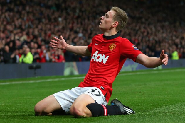 MANCHESTER, ENGLAND - MAY 06:  James Wilson of Manchester United celebrates scoring the second goal during the Barclays Premier League match between Manchester United and Hull City at Old Trafford on May 6, 2014 in Manchester, England.  (Photo by Alex Livesey/Getty Images)