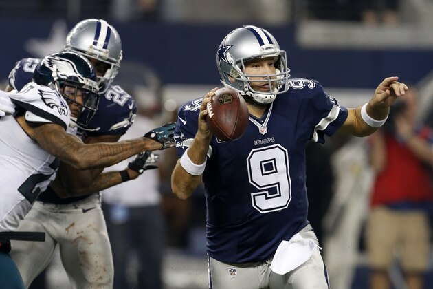 Philadelphia Eagles cornerback Nolan Carroll pressures as Dallas Cowboys' Tony Romo (9) scrambles out of the pocket trying to pass during the second half of an NFL football game, Thursday, Nov. 27, 2014, in Arlington, Texas. (AP Photo/John F. Rhodes)