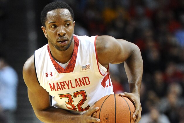 NEW YORK, NY - NOVEMBER 08:  Dez Wells #32 of the Maryland Terrapins looks to pass during the second half against the Connecticut Huskies at Barclays Center on November 8, 2013 in the Brooklyn borough of New York City. The Huskies defeat the Terrapins 78-77.  (Photo by Maddie Meyer/Getty Images)