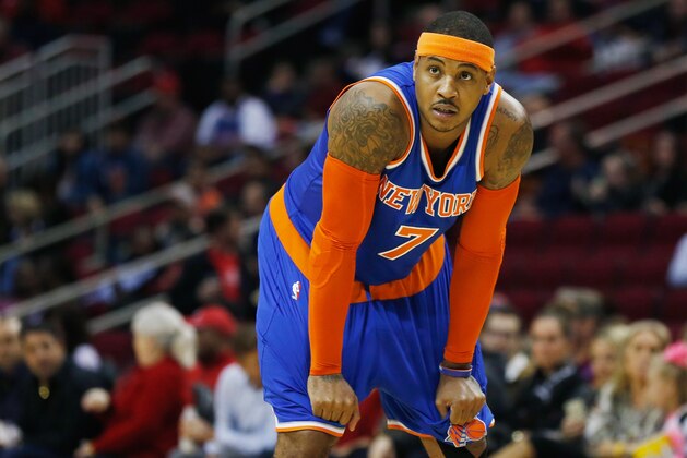 HOUSTON, TX - NOVEMBER 24:  Carmelo Anthony #7 of the New York Knicks waits on the court during their game against the Houston Rockets at the Toyota Center on November 24, 2014 in Houston, Texas.  NOTE TO USER: User expressly acknowledges and agrees that, by downloading and/or using this photograph, user is consenting to the terms and conditions of the Getty Images License Agreement. (Photo by Scott Halleran/Getty Images)