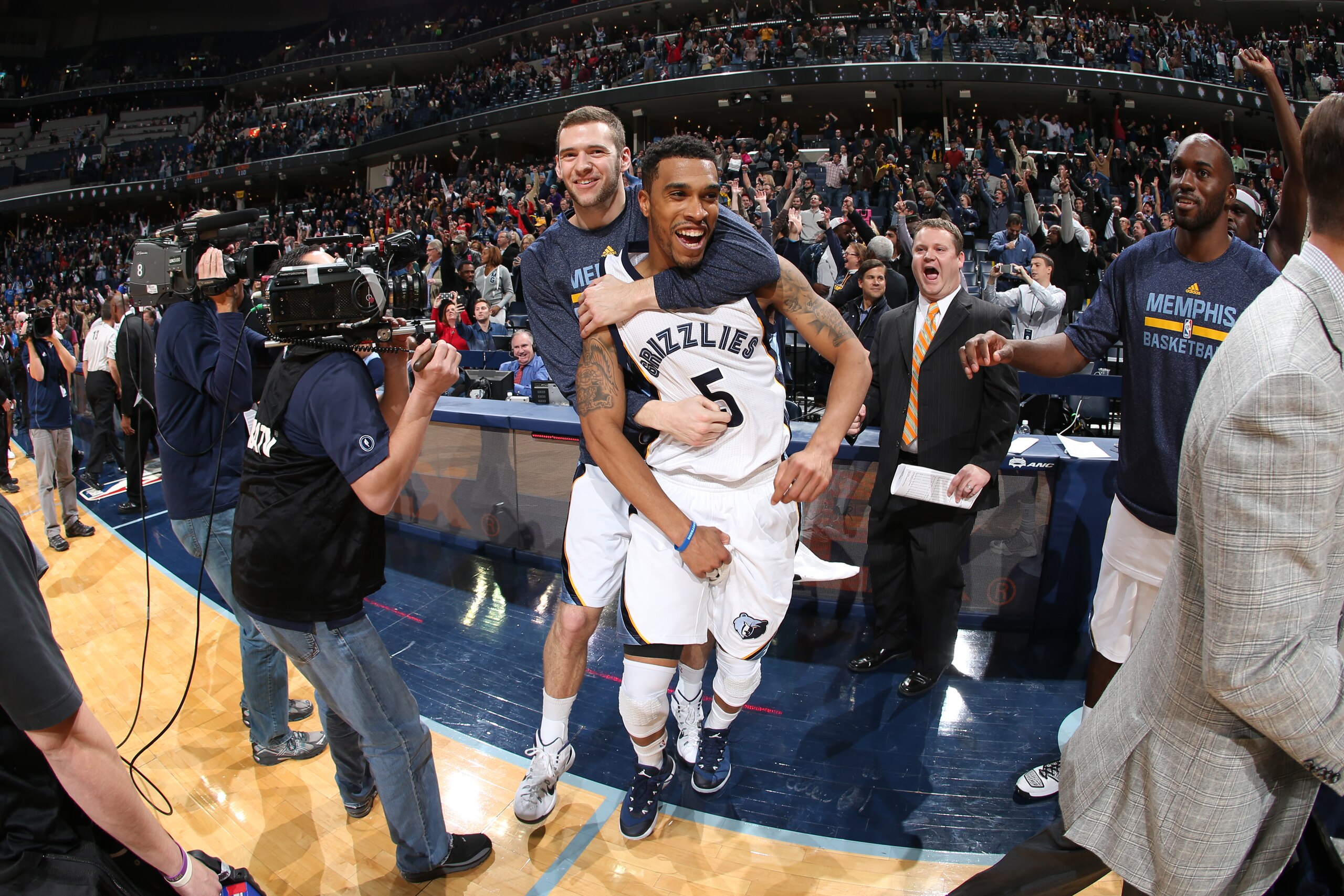 MEMPHIS, TN - NOVEMBER 13: Jon Leuer #30 of the Memphis Grizzlies congratulates and celebrates with Courtney Lee #5 after he hit the winning shot against the Sacramento Kings on November 13, 2014 at FedExForum in Memphis, Tennessee. NOTE TO USER: User expressly acknowledges and agrees that, by downloading and or using this photograph, User is consenting to the terms and conditions of the Getty Images License Agreement. Mandatory Copyright Notice: Copyright 2014 NBAE (Photo by Joe Murphy/NBAE via Getty Images) MEMPHIS, TN - NOVEMBER 13: Jon Leuer #30 of the Memphis Grizzlies congratulates and celebrates with Courtney Lee #5 after he hit the winning shot against the Sacramento Kings on November 13, 2014 at FedExForum in Memphis, Tennessee. NOTE TO USER: User expressly acknowledges and agrees that, by downloading and or using this photograph, User is consenting to the terms and conditions of the Getty Images License Agreement. Mandatory Copyright Notice: Copyright 2014 NBAE (Photo by Joe Murphy/NBAE via Getty Images)