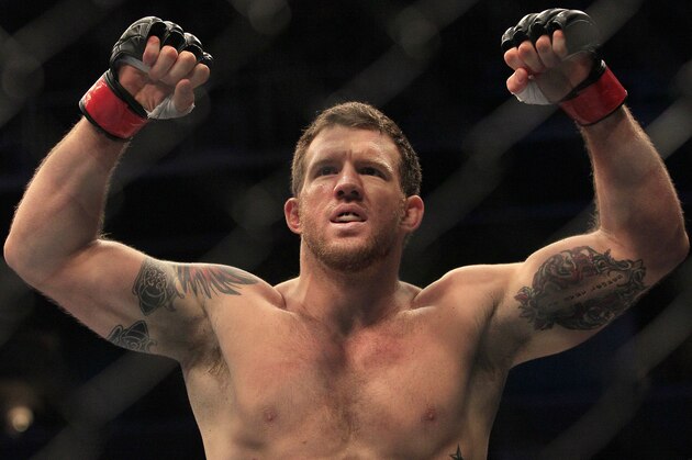 Ryan Bader celebrates after beating Jason Brilz by knockout in the first round of a UFC 139 Mixed Martial Arts light heavyweight bout in San Jose, Calif., Saturday, Nov. 19, 2011. (AP Photo/Jeff Chiu)