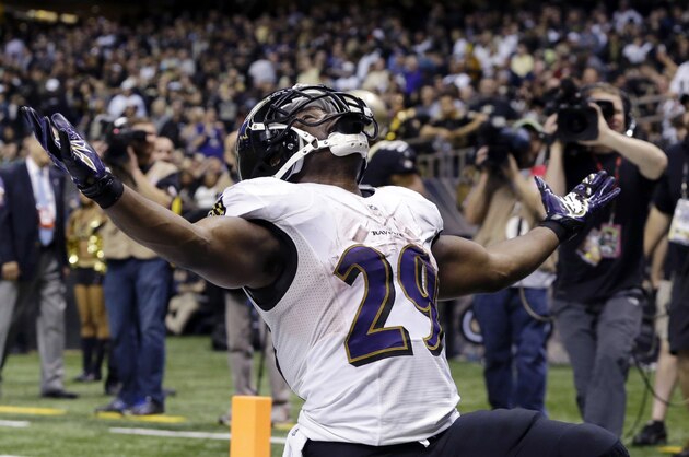 Baltimore Ravens running back Justin Forsett celebrates his touchdown carry in the second half of an NFL football game against the New Orleans Saints in New Orleans, Monday, Nov. 24, 2014. The Ravens won 34-27. (AP Photo/Jonathan Bachman)
