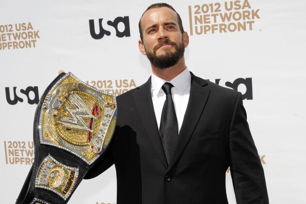 WWE wrestler CM Punk attends the USA network upfront presentation at Alice Tully Hall, Thursday, May 17, 2012 in New York. (AP Photo/Evan Agostini)