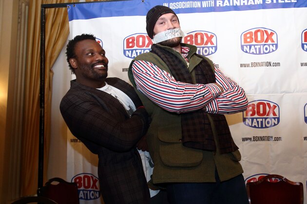 LONDON, ENGLAND - SEPTEMBER 22:  Dereck Chisora and Tyson Fury go head-to-head during the Dereck Chisora And Tyson Fury Press Conference at The Grosvenor House on September 22, 2014 in London, England.  (Photo by Jordan Mansfield/Getty Images)