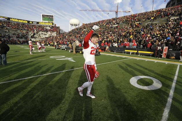 Nebraska defensive back Nate Gerry reacts as he walks off the field after an NCAA college football game against Iowa, Friday, Nov. 28, 2014, in Iowa City, Iowa. Nebraska won 37-34 in overtime. (AP Photo/Charlie Neibergall)