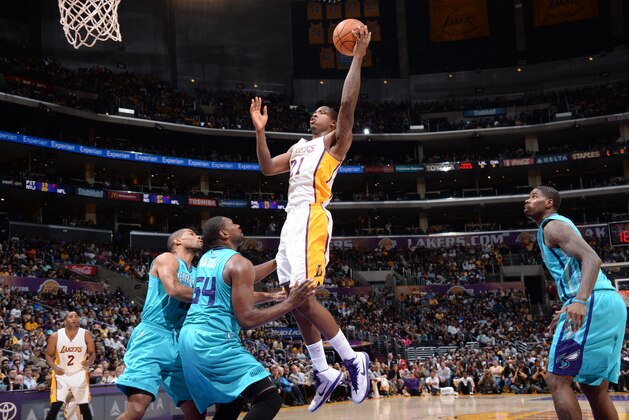 LOS ANGELES, CA - NOVEMBER 9:  Ed Davis #21 of the Los Angeles Lakers goes to the basket against the Charlotte Hornets on November 9, 2014 at Staples Center in Los Angeles, California. NOTE TO USER: User expressly acknowledges and agrees that, by downloading and or using this Photograph, user is consenting to the terms and conditions of the Getty Images License Agreement. Mandatory Copyright Notice: Copyright 2014 NBAE (Photo by Andrew D. Bernstein/NBAE via Getty Images)