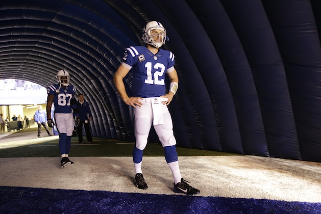 Indianapolis Colts quarterback Andrew Luck (12) waits to be introduced before an NFL football game against the Jacksonville Jaguars Sunday, Nov. 23, 2014 in Indianapolis. (AP Photo/AJ Mast)