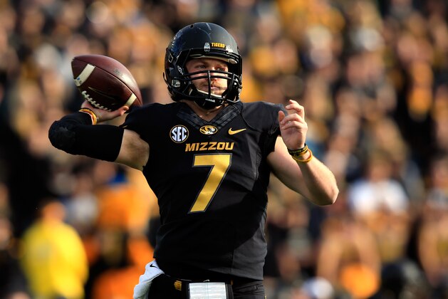 COLUMBIA, MO - NOVEMBER 28:  Quarterback Maty Mauk #7 of the Missouri Tigers passes during the game against the Arkansas Razorbacks at Faurot Field/Memorial Stadium on November 28, 2014 in Columbia, Missouri.  (Photo by Jamie Squire/Getty Images)