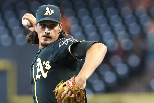 Oakland Athletics' Jeff Samardzija delivers a pitch against the Houston Astros in the first inning of a baseball game Monday, Aug. 25, 2014, in Houston. (AP Photo/Pat Sullivan)