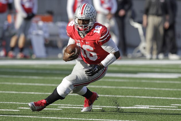 Ohio State quarterback J.T. Barrett plays against Indiana in an NCAA college football game Saturday, Nov. 22, 2014, in Columbus, Ohio. (AP Photo/Jay LaPrete)