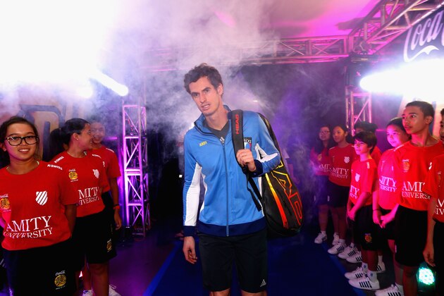MANILA, PHILIPPINES - NOVEMBER 28:  Andy Murray of the Manila Mavericks walks out  at the start of his teams series of matches at the Coca-Cola International Premier Tennis League at the Mall of Asia Arena on November 28, 2014 in Manila, Philippines.  (Photo by Clive Brunskill/Getty Images for IPTL 2014)