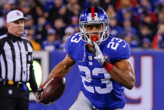 Nov 23, 2014; East Rutherford, NJ, USA;  New York Giants running back Rashad Jennings (23) runs for first down against the Dallas Cowboys during the first quarter at MetLife Stadium. Mandatory Credit: Jim O'Connor-USA TODAY Sports