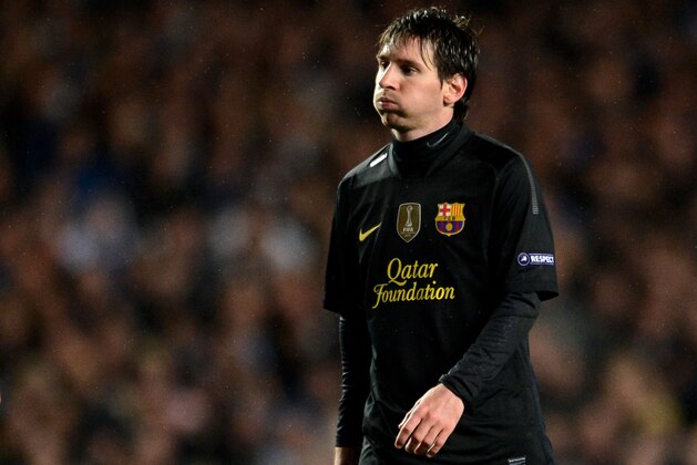 LONDON, ENGLAND - APRIL 18:  Lionel Messi of Barcelona looks dejected during the UEFA Champions League Semi Final first leg match between Chelsea and Barcelona at Stamford Bridge on April 18, 2012 in London, England.  (Photo by Jasper Juinen/Getty Images)