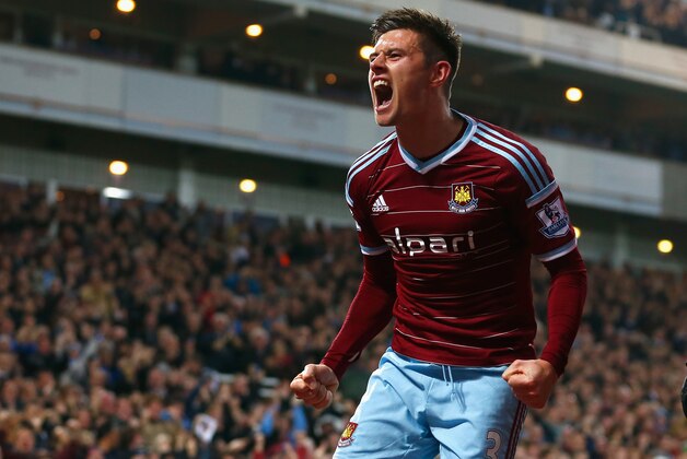 LONDON, ENGLAND - NOVEMBER 29:  Aaron Cresswell of West Ham celebrates scoring opening goal during the Barclays Premier League match between West Ham United and Newcastle United at Boleyn Ground on November 29, 2014 in London, England.  (Photo by Julian Finney/Getty Images)