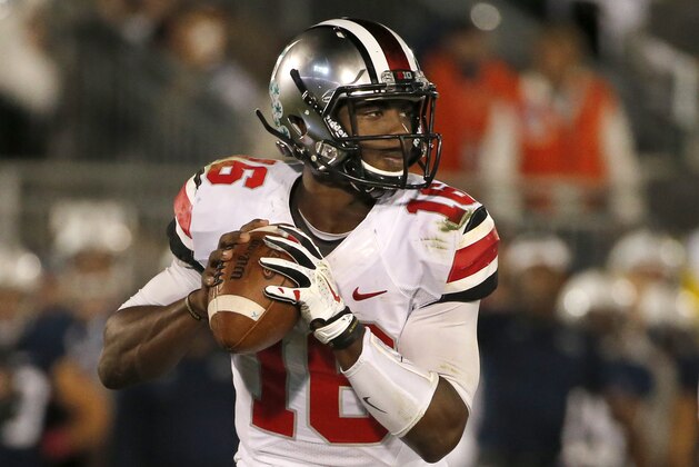 Ohio State quarterback J.T. Barrett (16) throws a pass during the fourth quarter of an NCAA college football game against Penn State in State College, Pa., Saturday, Oct. 25, 2014. Ohio State won 31-24. (AP Photo/Gene J. Puskar)