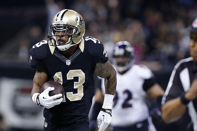 New Orleans Saints wide receiver Joe Morgan (13) carries for a long gain in the first half of  an NFL football game against the Baltimore Ravens in New Orleans, Monday, Nov. 24, 2014. (AP Photo/Jonathan Bachman)