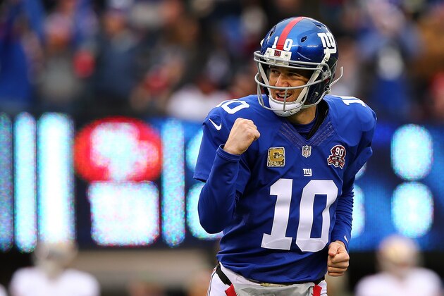 EAST RUTHERFORD, NJ - NOVEMBER 16:  Eli Manning #10 of the New York Giants celebrates after throwing a touchdown in the first quarter against the San Francisco 49ers at MetLife Stadium on November 16, 2014 in East Rutherford, New Jersey.  (Photo by Elsa/Getty Images)