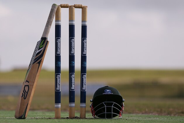 MELBOURNE, AUSTRALIA - NOVEMBER 29:  A Langwarrin club cricket bat rests on stumps at Lloyd Park before an U/12 match between Langwarrin and Somerville at Lloyd Park on November 29, 2014 in Melbourne, Australia. Domestic cricket competition resumed today around Australia for the first time following the death of cricketer Phillip Hughes in Sydney on Thursday.  (Photo by Michael Dodge/Getty Images)