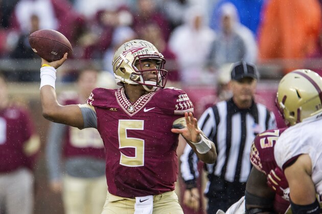 Florida State quarterback Jameis Winston throws in the first half of an NCAA college football game against Boston College in Tallahassee, Fla., Saturday, Nov. 22, 2014.  Florida State defeated Boston College 20-17.  (AP Photo/Mark Wallheiser)
