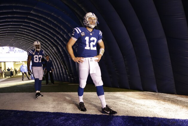 Indianapolis Colts quarterback Andrew Luck (12) waits to be introduced before an NFL football game against the Jacksonville Jaguars Sunday, Nov. 23, 2014 in Indianapolis. (AP Photo/AJ Mast)