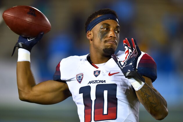 Arizona wide receiver Samajie Grant before the start of an NCAA college football game against UCLA, Saturday, Nov. 1, 2014, in Pasadena, Calif. (AP Photo/Gus Ruelas)