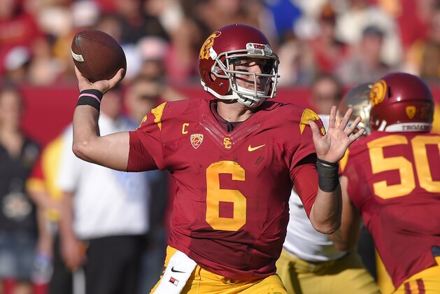 Southern California quarterback Cody Kessler passes during the first half of an NCAA college football game against Notre Dame, Saturday, Nov. 29, 2014, in Los Angeles. (AP Photo/Mark J. Terrill)