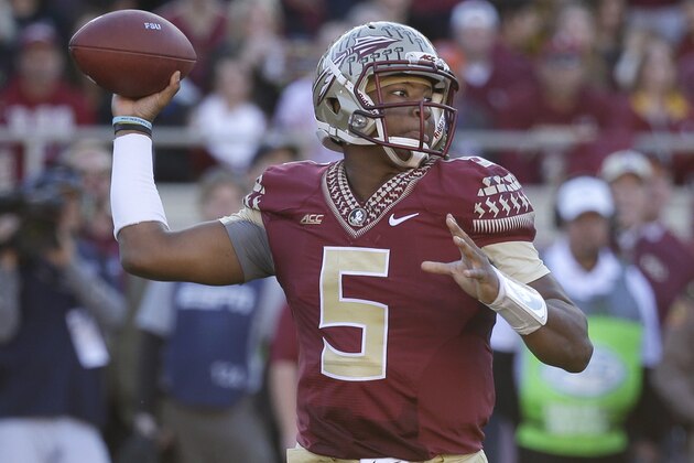 Florida State quarterback Jameis Winston (5) throws a pass during the first half of an NCAA college football game against Florida in Tallahassee, Fla., Saturday, Nov. 29, 2014. (AP Photo/John Raoux)
