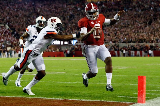 TUSCALOOSA, AL - NOVEMBER 29:  Blake Sims #6 of the Alabama Crimson Tide runs for an 11 yard touchdown in the fourth quarter against the Auburn Tigers during the Iron Bowl at Bryant-Denny Stadium on November 29, 2014 in Tuscaloosa, Alabama.  (Photo by Kevin C. Cox/Getty Images)