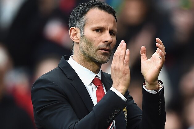 MANCHESTER, ENGLAND - APRIL 26:  Ryan Giggs of Manchester United applauds the fans after a rousing victory in his first match as manager during the Barclays Premier League match between Manchester United and Norwich City at Old Trafford on April 26, 2014 in Manchester, England.  (Photo by Laurence Griffiths/Getty Images)