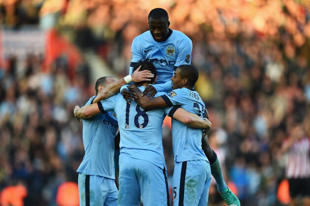 SOUTHAMPTON, ENGLAND - NOVEMBER 30:  Frank Lampard of Manchester City celebrates with Pablo Zabaleta (L), Yaya Toure (top) and Fernandinho (R) as he scores their second goal during the Barclays Premier League match between Southampton and Manchester City at St Mary's Stadium on November 30, 2014 in Southampton, England.  (Photo by Shaun Botterill/Getty Images)