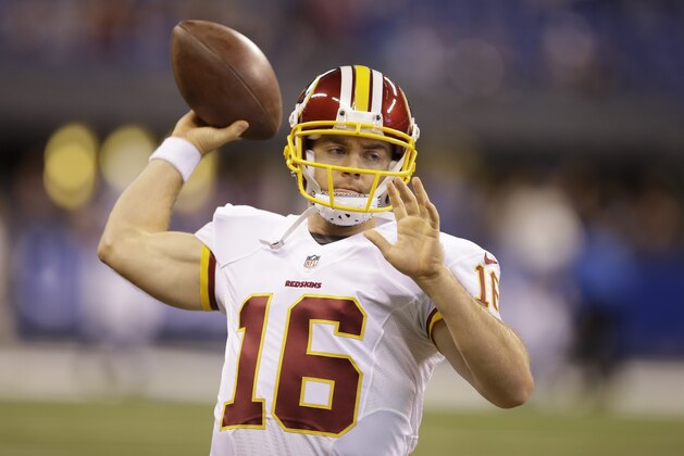 Washington Redskins quarterback Colt McCoy throws before an NFL football game against the Indianapolis Colts in Indianapolis, Sunday, Nov. 30, 2014. (AP Photo/Darron Cummings)