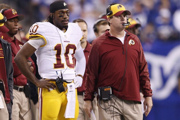 INDIANAPOLIS, IN - NOVEMBER 30: Robert Griffin III #10 and head coach Jay Gruden of the Washington Redskins look on in the first half of the game against the Indianapolis Colts at Lucas Oil Stadium on November 30, 2014 in Indianapolis, Indiana. (Photo by Joe Robbins/Getty Images)