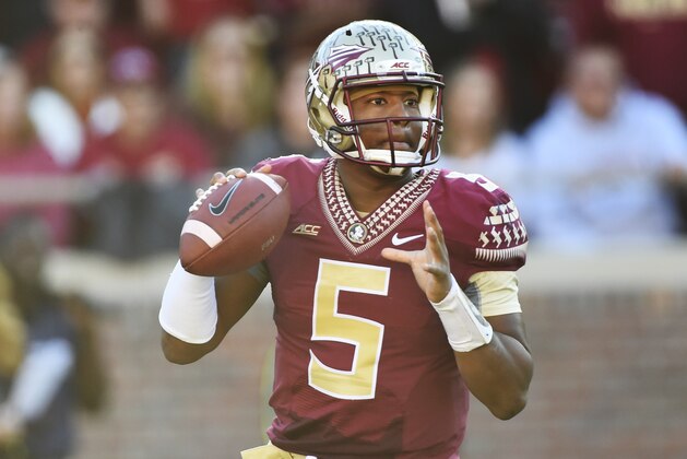 Nov 29, 2014; Tallahassee, FL, USA; Florida State Seminoles quarterback Jameis Winston (5) looks to throw during the first quarter against the Florida Gators at Doak Campbell Stadium. Mandatory Credit: Tommy Gilligan-USA TODAY Sports