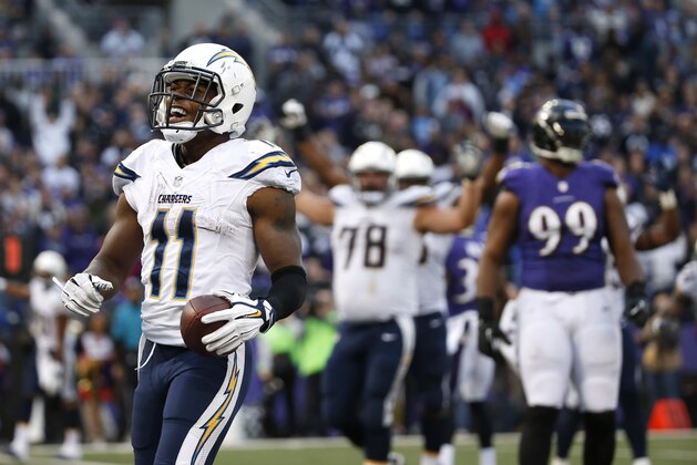 San Diego Chargers wide receiver Eddie Royal (11) celebrates his touchdown in the second half of an NFL football game against the Baltimore Ravens, Sunday, Nov. 30, 2014, in Baltimore. San Diego won 34-33. (AP Photo/Alex Brandon)