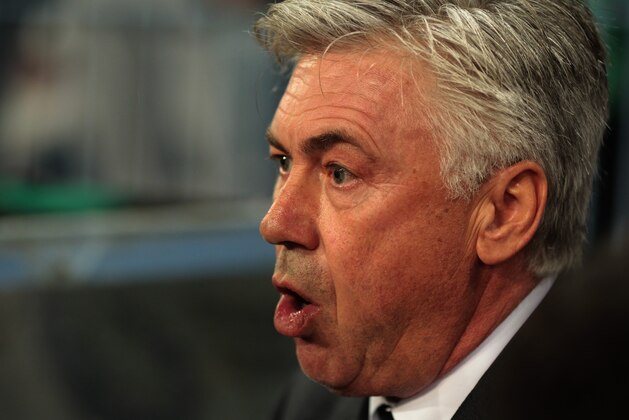 MALAGA, SPAIN - NOVEMBER 29:  Head coach Carlo Ancelotti, of Real Madrid reacts during the La Liga match between Malaga CF and Real Madrid CF at La Rosaleda studium on November 29, 2014 in Malaga, Spain. (Photo by Sergio Camacho/Getty Images)