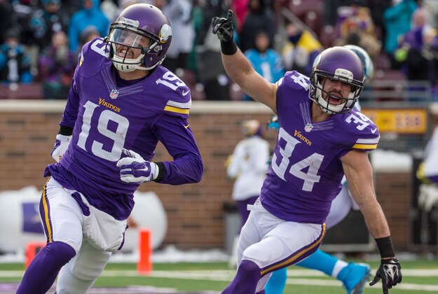 Nov 30, 2014; Minneapolis, MN, USA; Minnesota Vikings wide receiver Adam Thielen (19) celebrates his touchdown with safety Andrew Sendejo (34) during the first quarter against the Carolina Panthers at TCF Bank Stadium. Mandatory Credit: Brace Hemmelgarn-USA TODAY Sports