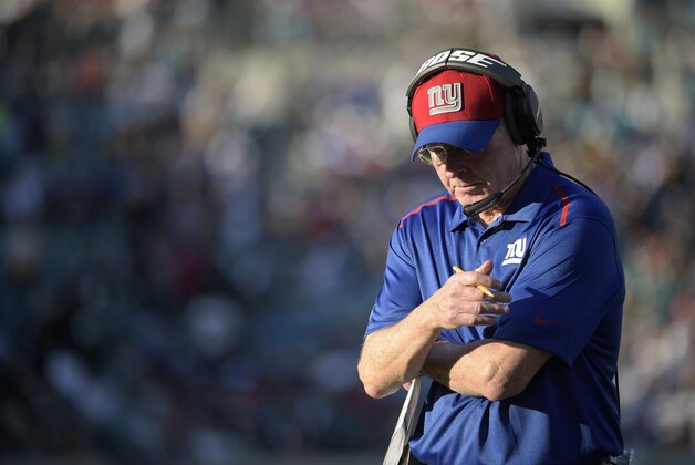 New York Giants head coach Tom Coughlin walks the sideline during the second half of an NFL football game against the Jacksonville Jaguars in Jacksonville, Fla., Sunday, Nov. 30, 2014. The Jaguars won 25-24.(AP Photo/Phelan M. Ebenhack)