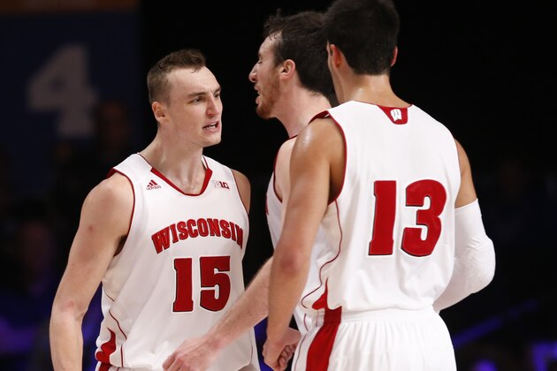 Nov 27, 2014; Paradise Island, BAHAMAS; Wisconsin Badgers forward Sam Dekker (15) celebrates a score with  forward Frank Kaminsky (middle) and forward Duje Dukan (13) during the game against the Georgetown Hoyas at Atlantis Resort. Mandatory Credit: Kevin Jairaj-USA TODAY Sports